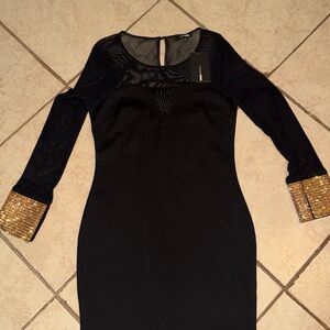 Elegant Black Dress with Gold Accents